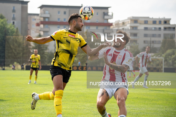 Manuel Torres and Grzegorz Skowronski play in a game between Wieczysta Krakow and Pogon Grodzisk Mazowiecki in Krakow, Poland, on September...