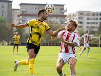 Manuel Torres and Grzegorz Skowronski play in a game between Wieczysta Krakow and Pogon Grodzisk Mazowiecki in Krakow, Poland, on September...