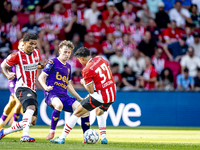 Go Ahead Eagles player Jakob Breum, PSV player Malik Tillman, and PSV player Richard Ledezma during the match PSV vs. Go Ahead Eagles at the...