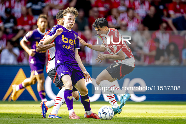 Go Ahead Eagles player Jakob Breum and PSV player Richard Ledezma during the match PSV vs. Go Ahead Eagles at the Philips Stadium for the Du...