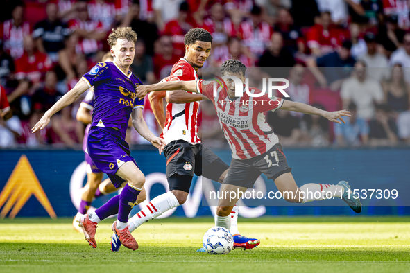 Go Ahead Eagles player Jakob Breum and PSV player Richard Ledezma during the match PSV vs. Go Ahead Eagles at the Philips Stadium for the Du...