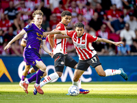 Go Ahead Eagles player Jakob Breum and PSV player Richard Ledezma during the match PSV vs. Go Ahead Eagles at the Philips Stadium for the Du...