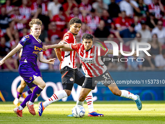 Go Ahead Eagles player Jakob Breum and PSV player Richard Ledezma during the match PSV vs. Go Ahead Eagles at the Philips Stadium for the Du...