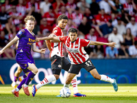 Go Ahead Eagles player Jakob Breum and PSV player Richard Ledezma during the match PSV vs. Go Ahead Eagles at the Philips Stadium for the Du...