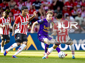 Go Ahead Eagles player Jakob Breum, PSV player Malik Tillman, and PSV player Richard Ledezma during the match PSV vs. Go Ahead Eagles at the...