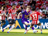 Go Ahead Eagles player Jakob Breum, PSV player Malik Tillman, and PSV player Richard Ledezma during the match PSV vs. Go Ahead Eagles at the...