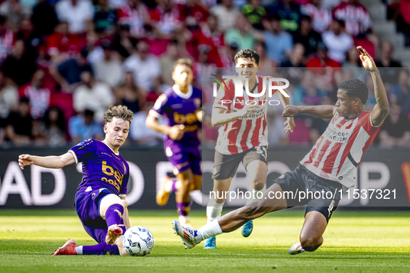 Go Ahead Eagles player Jakob Breum and PSV player Ryan Flamingo during the match PSV vs. Go Ahead Eagles at the Philips Stadium for the Dutc...