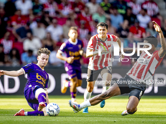 Go Ahead Eagles player Jakob Breum and PSV player Ryan Flamingo during the match PSV vs. Go Ahead Eagles at the Philips Stadium for the Dutc...