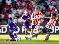 Go Ahead Eagles player Jakob Breum and PSV player Ryan Flamingo during the match PSV vs. Go Ahead Eagles at the Philips Stadium for the Dutc...