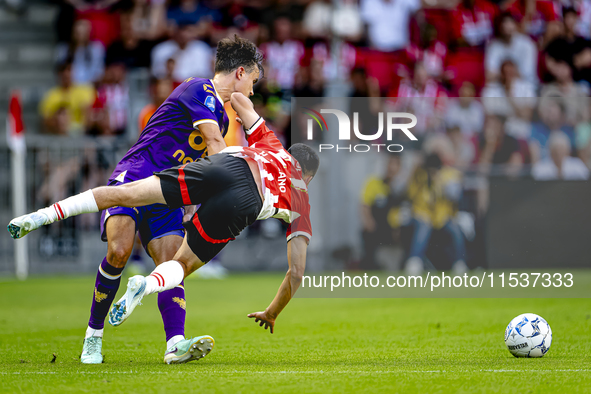 Go Ahead Eagles player Mats Deijl and PSV player Hirving Lozano during the match PSV vs. Go Ahead Eagles at the Philips Stadium for the Dutc...