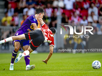 Go Ahead Eagles player Mats Deijl and PSV player Hirving Lozano during the match PSV vs. Go Ahead Eagles at the Philips Stadium for the Dutc...