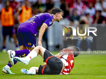 Go Ahead Eagles player Mats Deijl and PSV player Hirving Lozano during the match PSV vs. Go Ahead Eagles at the Philips Stadium for the Dutc...