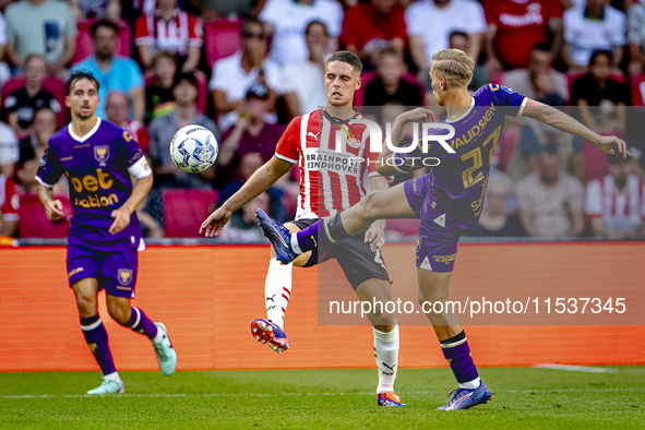 PSV player Joey Veerman and Go Ahead Eagles player Finn Stokkers during the match PSV vs. Go Ahead Eagles at the Philips Stadium for the Dut...