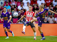 PSV player Joey Veerman and Go Ahead Eagles player Finn Stokkers during the match PSV vs. Go Ahead Eagles at the Philips Stadium for the Dut...