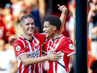 PSV player Joey Veerman and PSV player Malik Tillman celebrate a goal during the match between PSV and Go Ahead Eagles at the Philips Stadiu...