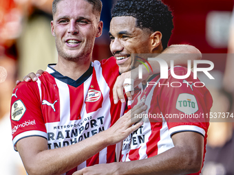 PSV player Joey Veerman and PSV player Malik Tillman celebrate a goal during the match between PSV and Go Ahead Eagles at the Philips Stadiu...