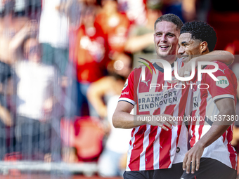 PSV player Joey Veerman and PSV player Malik Tillman celebrate a goal during the match between PSV and Go Ahead Eagles at the Philips Stadiu...