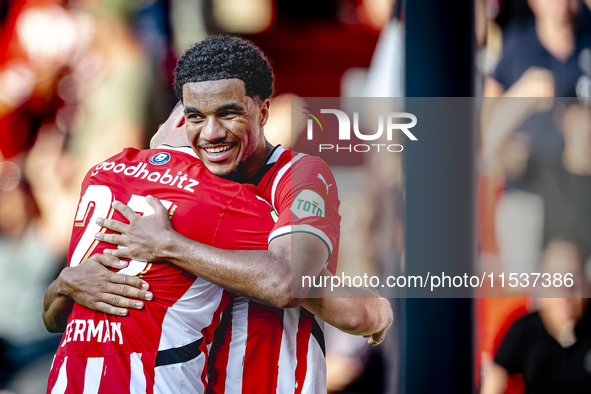 PSV player Malik Tillman and PSV player Joey Veerman celebrate the goal during the match between PSV and Go Ahead Eagles at the Philips Stad...