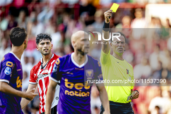 Referee Bas Nijhuis officiates the match between PSV and Go Ahead Eagles at the Philips Stadium for the Dutch Eredivisie 4th round season 20...