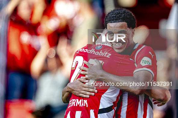 PSV player Malik Tillman and PSV player Joey Veerman celebrate the goal during the match between PSV and Go Ahead Eagles at the Philips Stad...