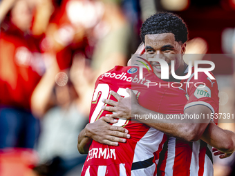 PSV player Malik Tillman and PSV player Joey Veerman celebrate the goal during the match between PSV and Go Ahead Eagles at the Philips Stad...