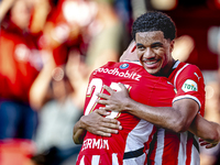 PSV player Malik Tillman and PSV player Joey Veerman celebrate the goal during the match between PSV and Go Ahead Eagles at the Philips Stad...