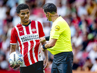 PSV player Malik Tillman and referee Bas Nijhuis during the match between PSV and Go Ahead Eagles at the Philips Stadium for the Dutch Eredi...