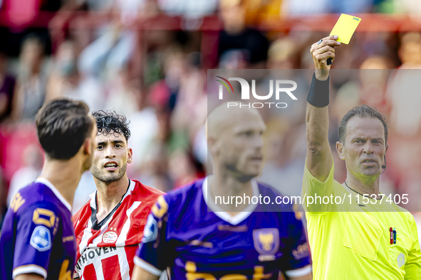 Referee Bas Nijhuis officiates the match between PSV and Go Ahead Eagles at the Philips Stadium for the Dutch Eredivisie 4th round season 20...