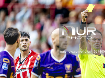 Referee Bas Nijhuis officiates the match between PSV and Go Ahead Eagles at the Philips Stadium for the Dutch Eredivisie 4th round season 20...