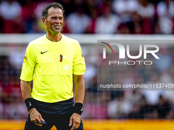 Referee Bas Nijhuis officiates the match between PSV and Go Ahead Eagles at the Philips Stadium for the Dutch Eredivisie 4th round season 20...