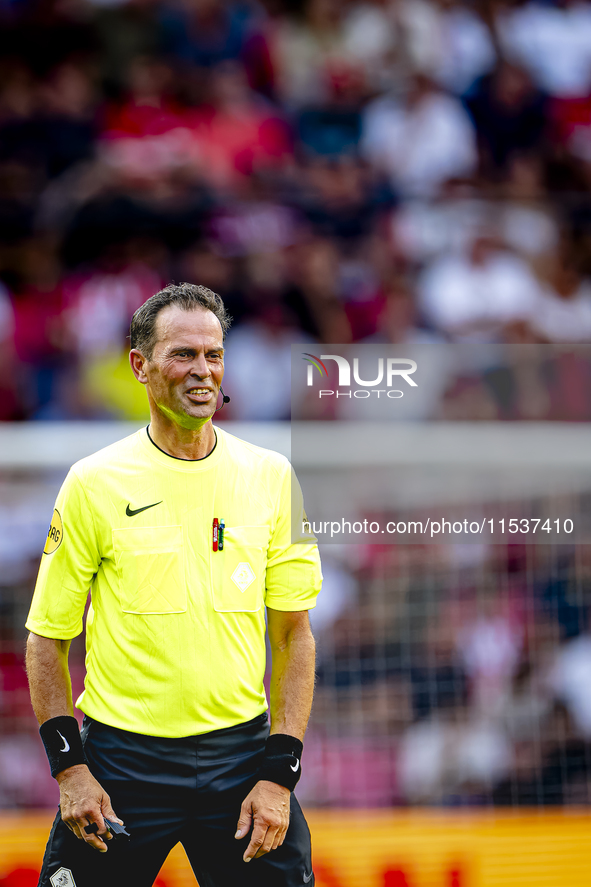 Referee Bas Nijhuis officiates the match between PSV and Go Ahead Eagles at the Philips Stadium for the Dutch Eredivisie 4th round season 20...