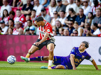 PSV player Couhaib Driouech and Go Ahead Eagles player Mats Deijl during the match PSV vs. Go Ahead Eagles at the Philips Stadium for the Du...