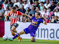 PSV player Couhaib Driouech and Go Ahead Eagles player Mats Deijl during the match PSV vs. Go Ahead Eagles at the Philips Stadium for the Du...