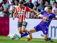 PSV player Couhaib Driouech and Go Ahead Eagles player Mats Deijl during the match PSV vs. Go Ahead Eagles at the Philips Stadium for the Du...