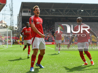 Chris Wood of Nottingham Forest celebrates after scoring a goal to make it 1-0 during the Premier League match between Nottingham Forest and...