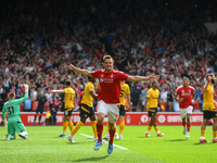 Chris Wood of Nottingham Forest celebrates after scoring a goal to make it 1-0 during the Premier League match between Nottingham Forest and...