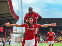 Chris Wood of Nottingham Forest celebrates with Callum Hudson-Odoi of Nottingham Forest after scoring a goal to make it 1-0 during the Premi...