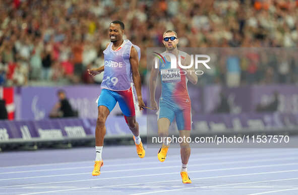 Timothee Adolphe of France in action in Men's 400m - T11 Final during the Paris 2024 Paralympic Games at Stade de France on September 1, 202...