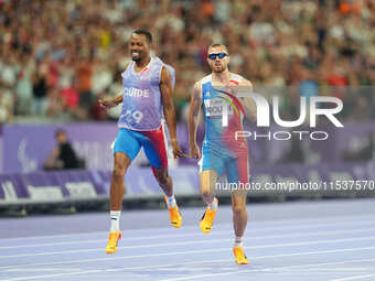 Timothee Adolphe of France in action in Men's 400m - T11 Final during the Paris 2024 Paralympic Games at Stade de France on September 1, 202...