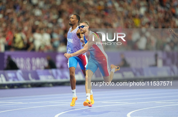 Timothee Adolphe of France in action in Men's 400m - T11 Final during the Paris 2024 Paralympic Games at Stade de France on September 1, 202...