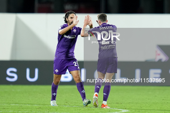 Robin Gosens of ACF Fiorentina celebrates with Yacine Adli after scoring second goal during the Serie A Enilive match between ACF Fiorentina...