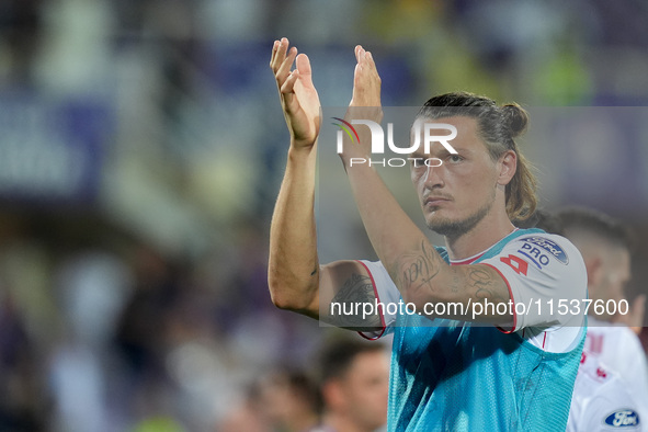 Milan Djuric of AC Monza applauds his supporters during the Serie A Enilive match between ACF Fiorentina and AC Monza at Stadio Artemio Fran...