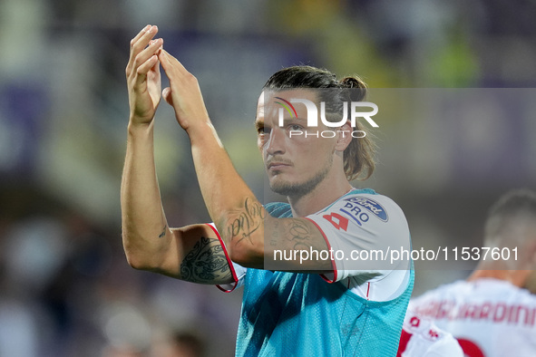 Milan Djuric of AC Monza applauds his supporters during the Serie A Enilive match between ACF Fiorentina and AC Monza at Stadio Artemio Fran...