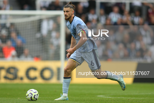 Tottenham Hotspur's Radu Dragusin during the Premier League match between Newcastle United and Tottenham Hotspur at St. James's Park in Newc...