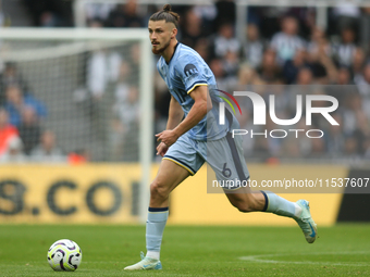 Tottenham Hotspur's Radu Dragusin during the Premier League match between Newcastle United and Tottenham Hotspur at St. James's Park in Newc...