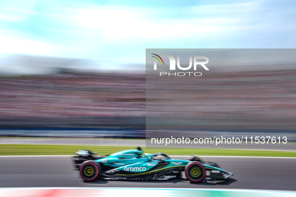 Lance Stroll of Canada drives the (18) Aston Martin Aramco F1 Team AMR24 during the Race of the Formula 1 Pirelli Gran Premio d'Italia 2024...