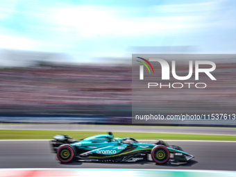 Lance Stroll of Canada drives the (18) Aston Martin Aramco F1 Team AMR24 during the Race of the Formula 1 Pirelli Gran Premio d'Italia 2024...