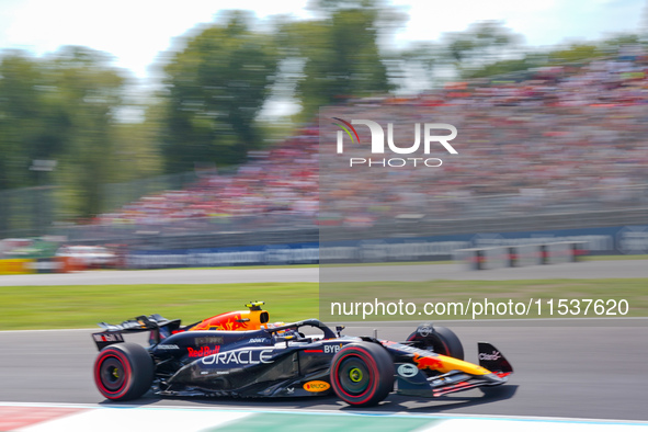 Sergio Perez of Mexico drives the (11) Oracle Red Bull Racing RB20 during the Race of the Formula 1 Pirelli Gran Premio d'Italia 2024 in Mon...