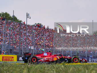 Carlos Sainz of Spain drives the (55) Scuderia Ferrari SF-24 during the Race of the Formula 1 Pirelli Gran Premio d'Italia 2024 in Monza, It...