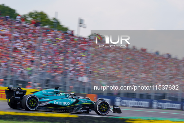 Lance Stroll of Canada drives the (18) Aston Martin Aramco F1 Team AMR24 during the Race of the Formula 1 Pirelli Gran Premio d'Italia 2024...